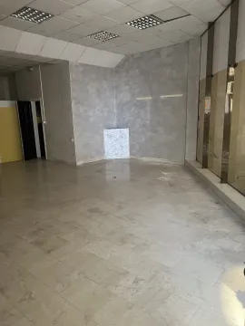 Empty commercial space with grey walls. - image 4
