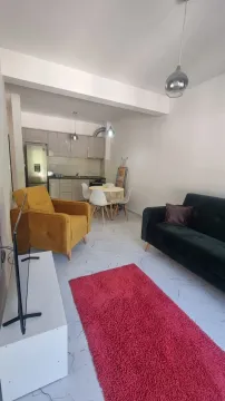 Living room connected with the dining area and kitchen. - image 3