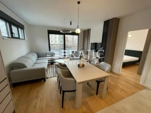 Living room with dining area in a modern apartment. - image 4