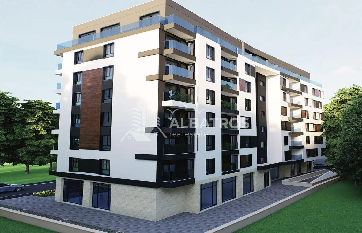 Spoljašnji izgled moderne stambene zgrade sa terasama i uređenim okruženjem.