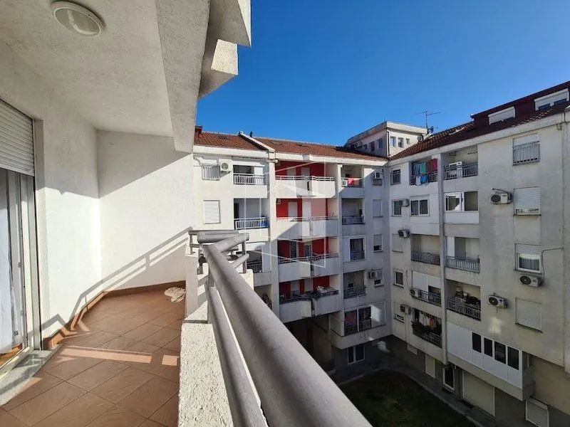 View from the apartment terrace towards neighboring residential buildings.