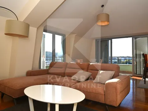 Living room with a sofa and access to the terrace. - image 2