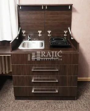 Compact wooden kitchen unit with a built-in sink and hotplate. - image 4