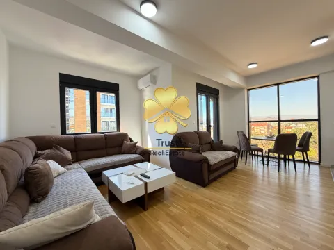 Spacious living room with sofa set and dining area. - image 3