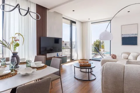 Modern and bright living room with a dining area and access to the terrace. - image 6
