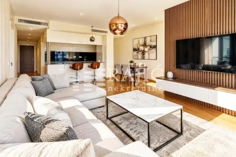 Modern and bright living room connected to the dining area and kitchen. - image 3