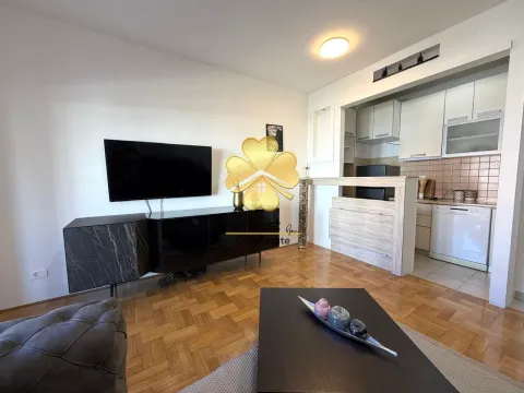 Living room connected to the kitchen in a bright interior. - image 4