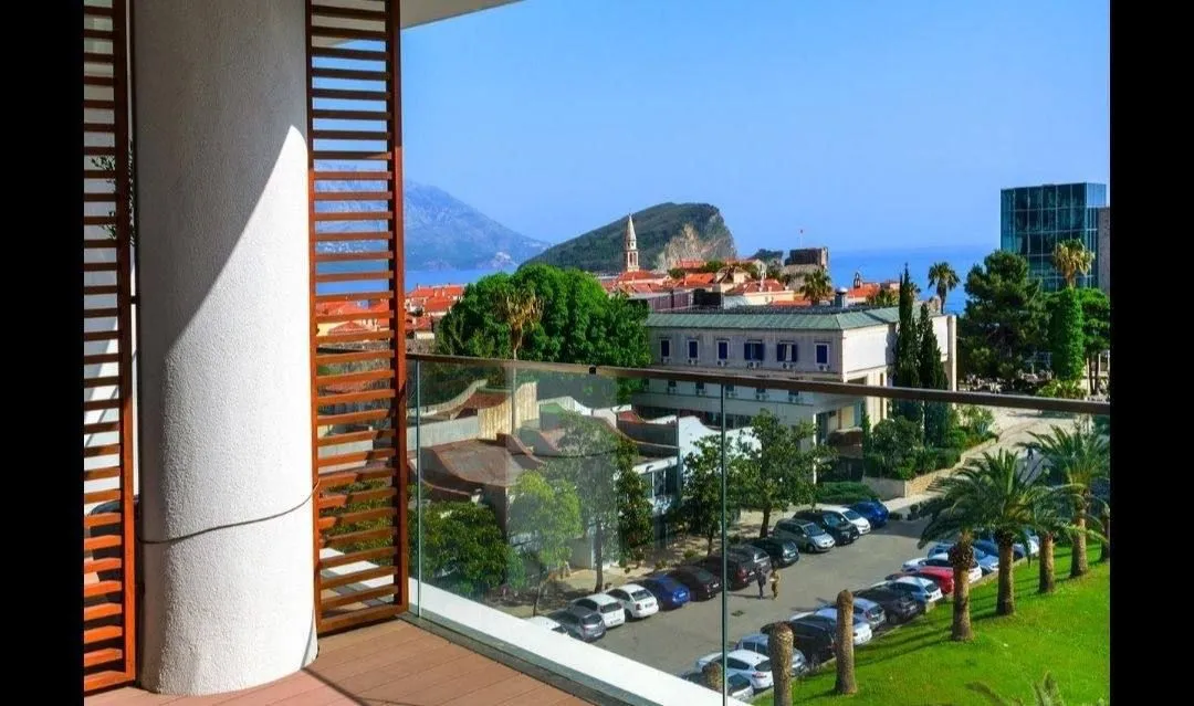 View from the terrace overlooking the city, park, and sea.