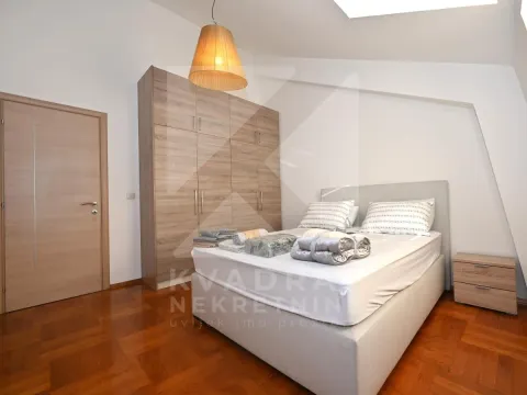 Bedroom with a double bed, large wardrobe, and wooden flooring. - image 7