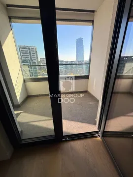 View of city buildings from the balcony. - image 14