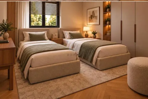 Bedroom with two single beds, a built-in wardrobe, and wooden flooring. - image 11