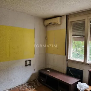View of part of the room with an air conditioner, window, and TV unit. - image 3