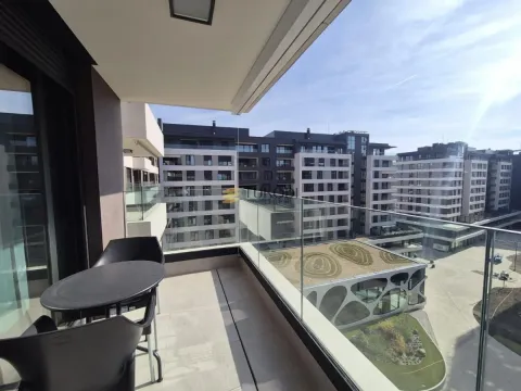 Modern balcony with seating set and a view of the neighborhood. - image 12
