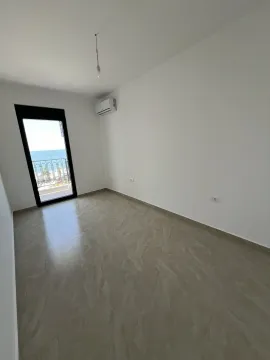 Empty room with a balcony and sea view. - image 3