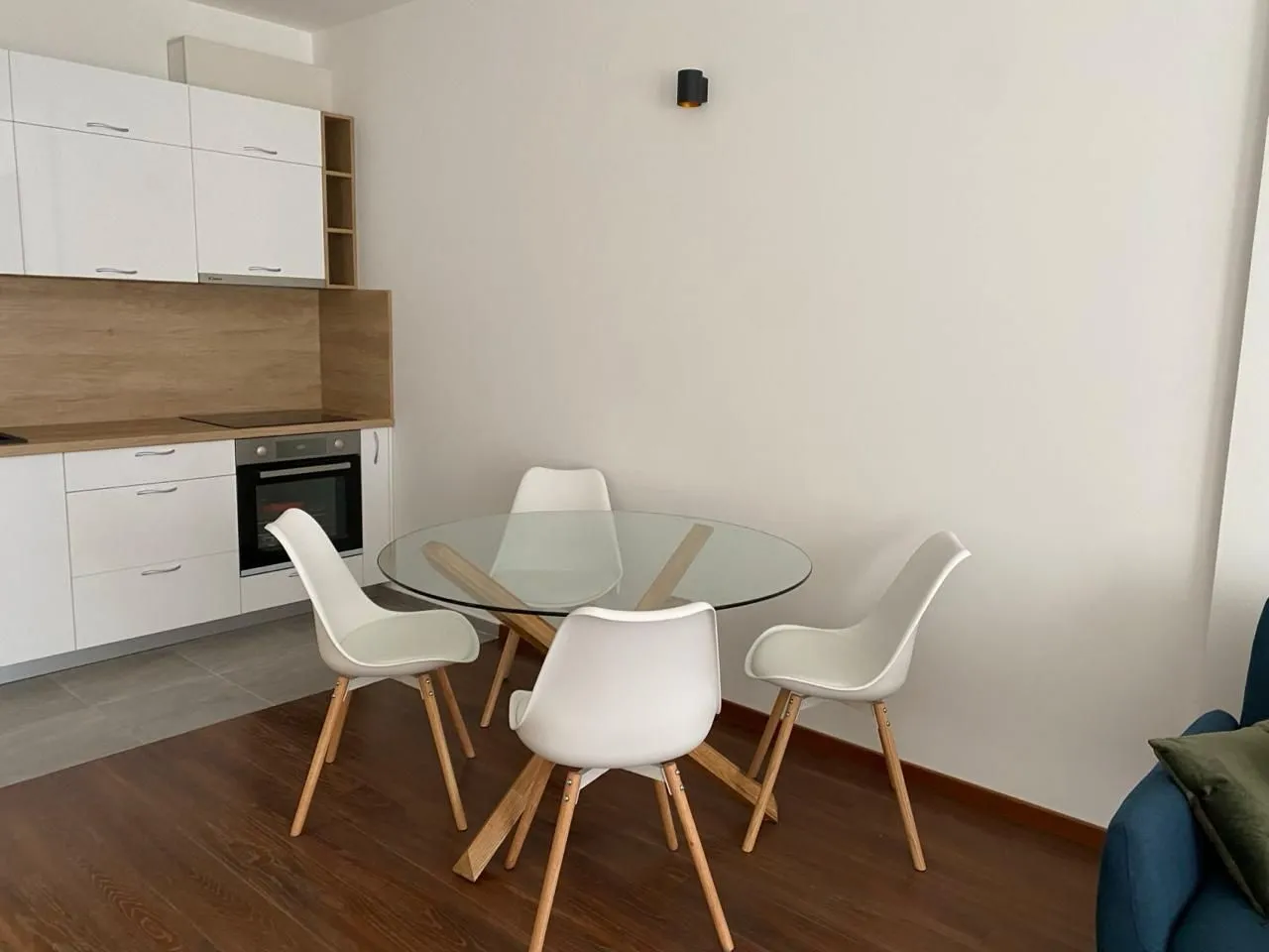 Living room with a dining area and a fitted kitchen.