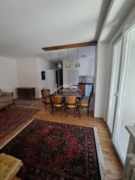Dnevna soba sa trpezarijom i pogledom na kuhinju. - image 4
