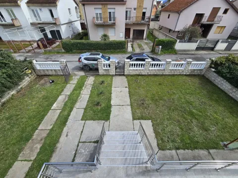 View from the house towards the landscaped yard and street. - image 14