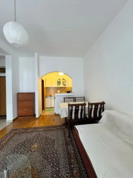 Living room with dining area and view of the kitchen. - image 2