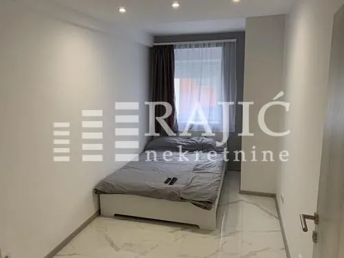 Smaller bedroom with a double bed.