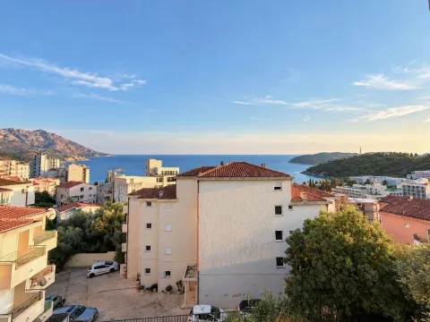 View of the sea and surrounding buildings from the property terrace. - image 8
