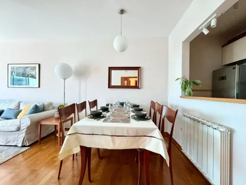 Dining area connected to the living room and kitchen. - image 5