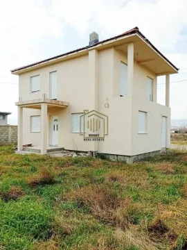 Exterior view of a two-story house with a yard. - image 3