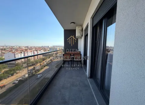 Modern spacious balcony with a view of the city and residential area. - image 15