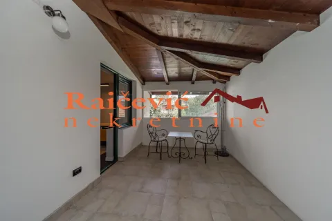 Enclosed terrace with a wooden ceiling and seating furniture. - image 10