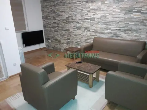 Living room with a seating set and TV. - image 5