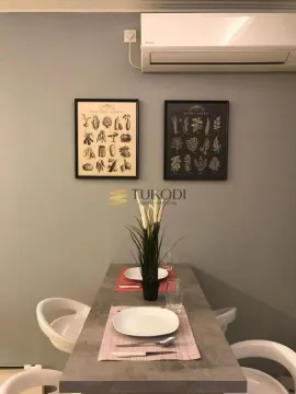 Dining table with chairs as part of the living room. - image 6