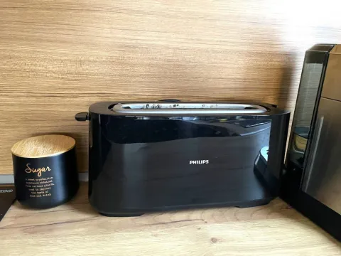 Close-up of the kitchen counter with appliances. - image 2