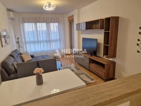 Living room with sofa, TV and dining table. - image 4