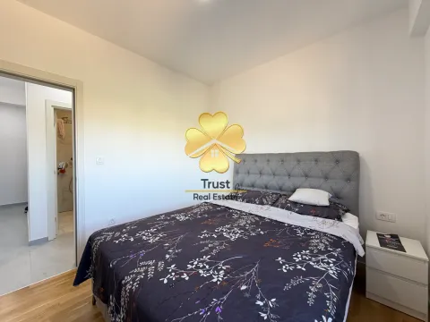 Bedroom with a double bed and a nightstand. - image 10