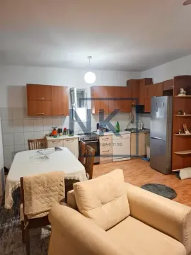 Open-plan space combining the kitchen, dining area, and living room. - image 5