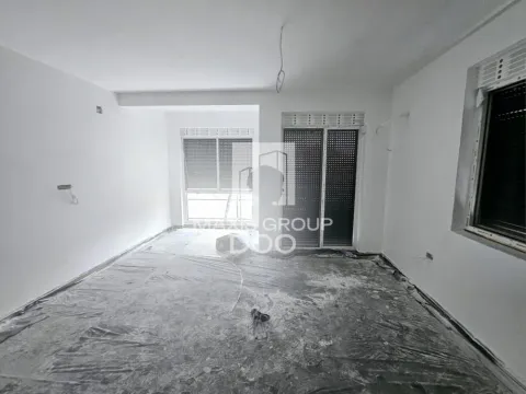 Empty room under renovation with protective foil on the floor. - image 2