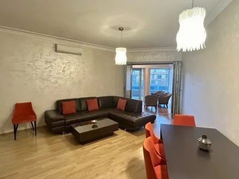 Spacious living room with sofa set and dining area. - image 2