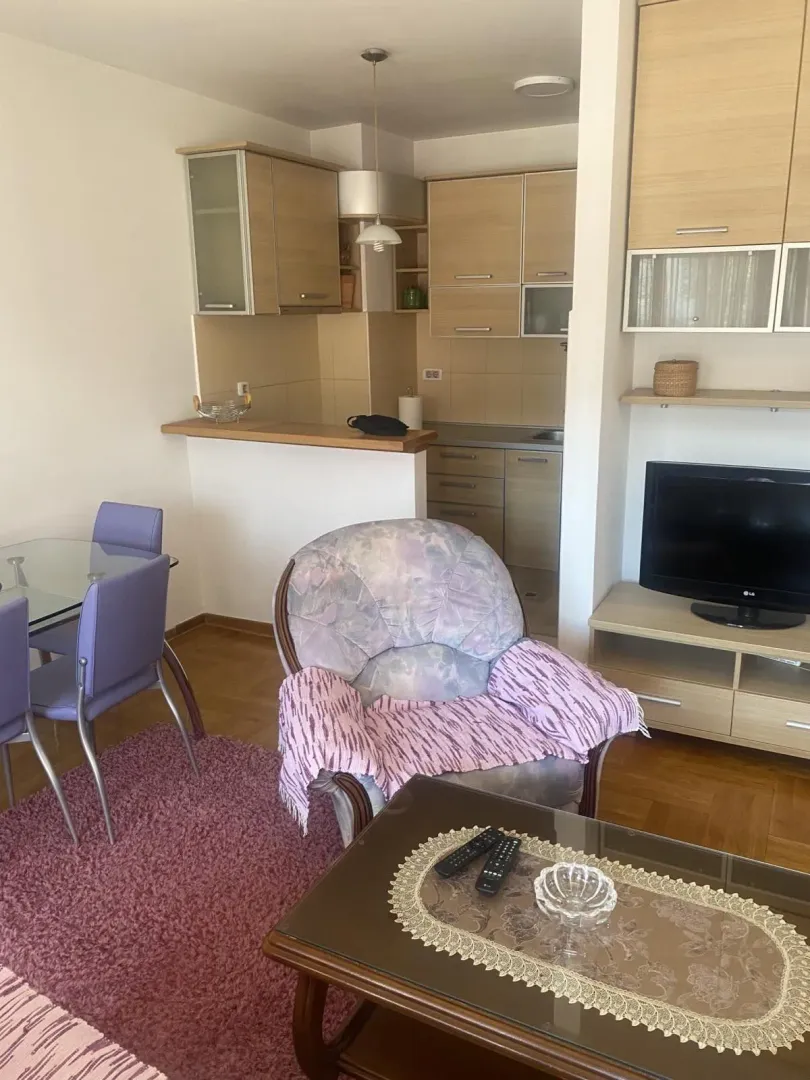 Living room with dining area and kitchen.