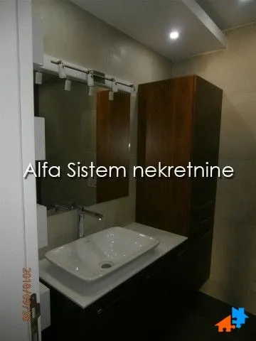 Bathroom with a sink and a mirror.