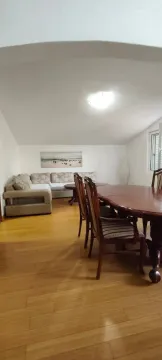 Spacious living room with seating set and dining table. - image 9