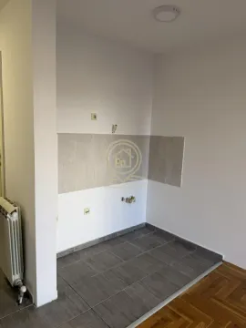 Small space designated for a kitchen with water and electricity connections. - image 4