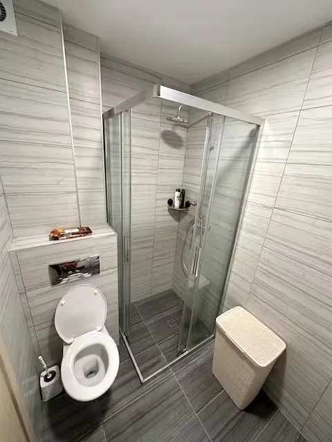 Modern bathroom with a walk-in shower.
