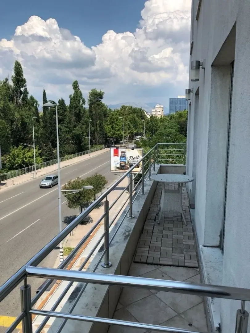 Terrace with a view of the street and city.