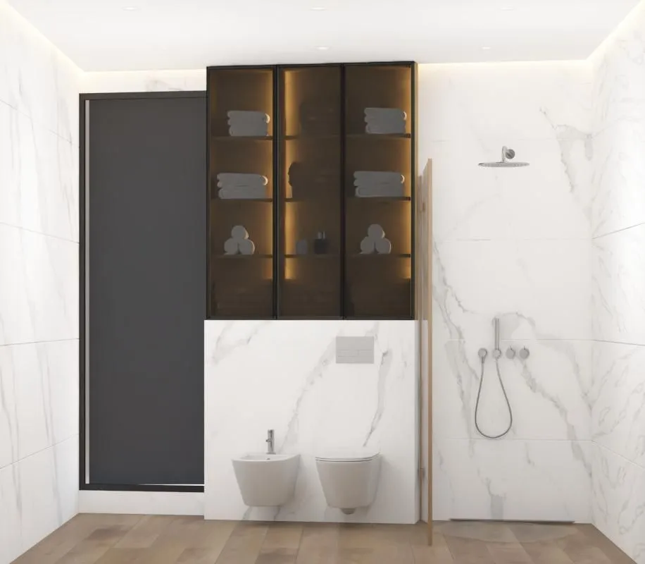 Moderne kupatilo sa bijelim mermernim pločicama, konzolnom šoljom, bideom i tušem.