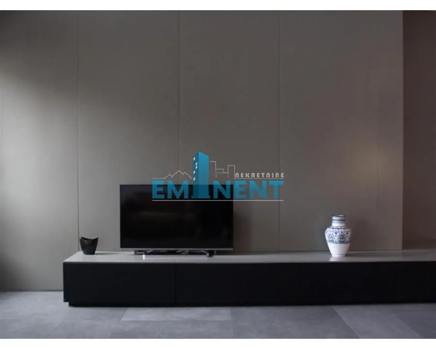 View of the TV unit with a television in the living room.