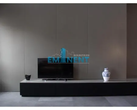 View of the TV unit with a television in the living room. - image 6