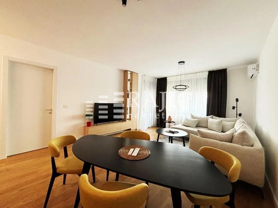 Spacious living room with a dining area and modern furniture.