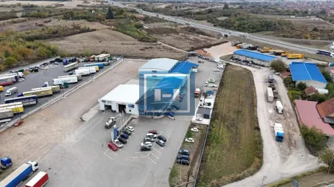 Aerial view of the business complex with warehouses and parking area. - image 13