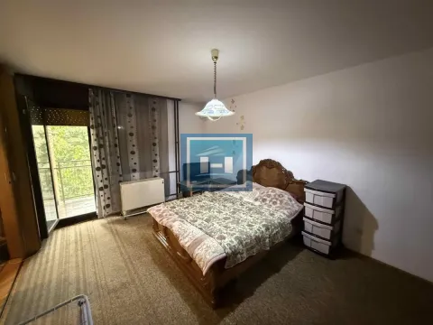 Furnished bedroom with a double bed and access to the terrace. - image 2