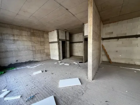 View of an unfurnished space in rough construction phase. - image 4