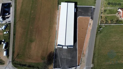 Aerial view of the building and the surrounding yard. - image 6